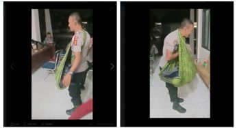 Viral di FB Polisi Bertugas Amankan Kotak Suara Sambil Gendong Anak